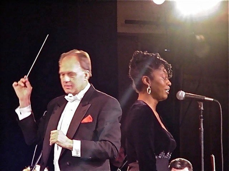 Conducting in Washington, DC with my good friend and terrific Gospel singer, MZuri Moyo Almbaye. (2000)