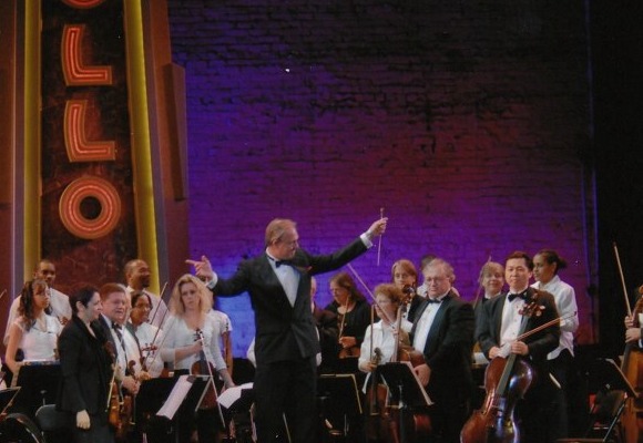 David Eaton conducting at the Apollo Theater